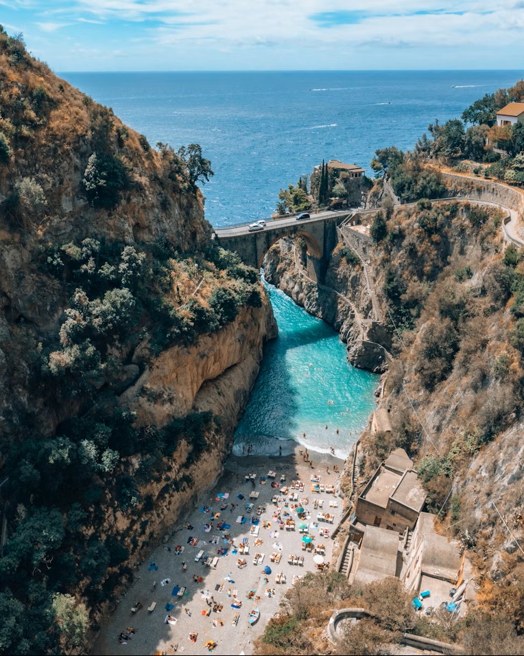 The 30-meter high bridge and narrow limestone gorge of Fiordo di Furore, a scenic stop on the Amalfi Coast drive