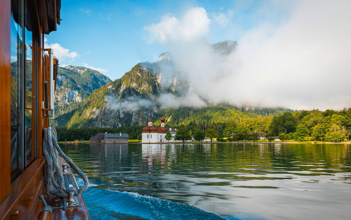 The St. Bartholomä pilgrimage church on Königssee lake shore during a Munich to Salzburg road trip