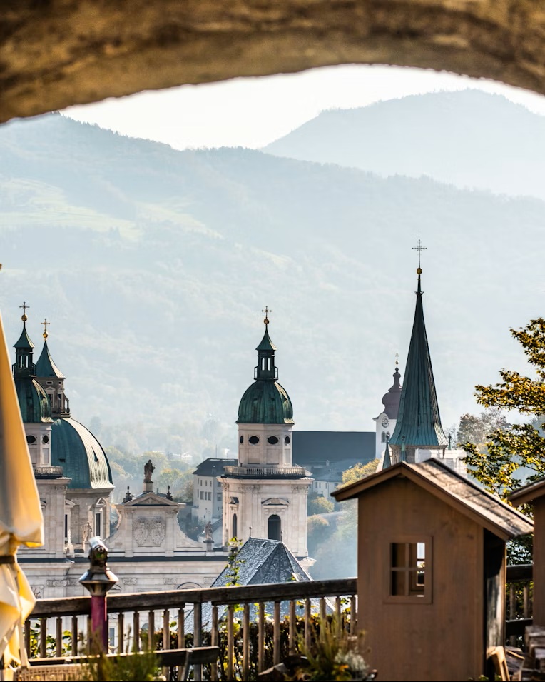Panoramic view of Salzburg Old Town and Hohensalzburg Fortress at the end of the scenic route from Munich