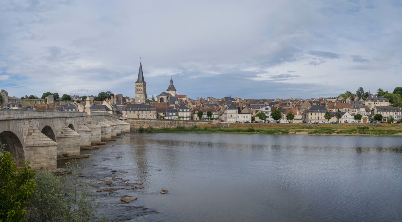 Romantic morning reflections of Gien stone bridge on a Valentine’s road trip from Paris