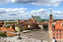 Panoramic view of central Warsaw with modern buildings and historic landmarks, marking the start of the road trip to Lublin.