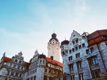 Historic skyline of Leipzig with classical architecture, church towers, and city streets in Germany.