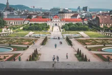 Panoramic view of Vienna, Austria, featuring the historic city center, St. Stephen's Cathedral, elegant imperial architecture, and the Danube skyline under soft daylight, showcasing the cultural charm of the starting point of a Vienna to Ljubljana road trip.