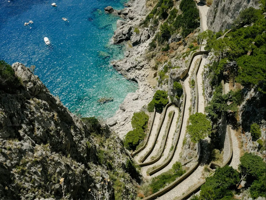 Scenic route along the Amalfi Coast by car featuring hidden gems, coastal cliffs, and Mediterranean sunset – 2026 travel guide by Wayro