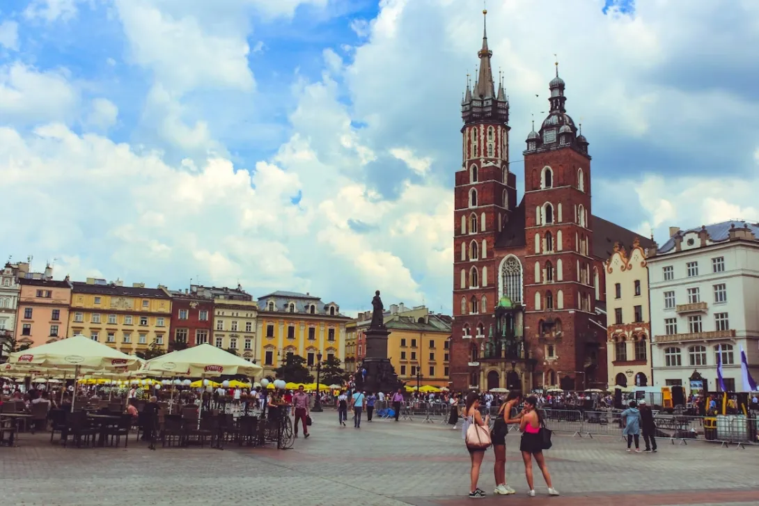 View of Krakow with Wawel Castle, historic old town architecture, and the Vistula River in Poland.