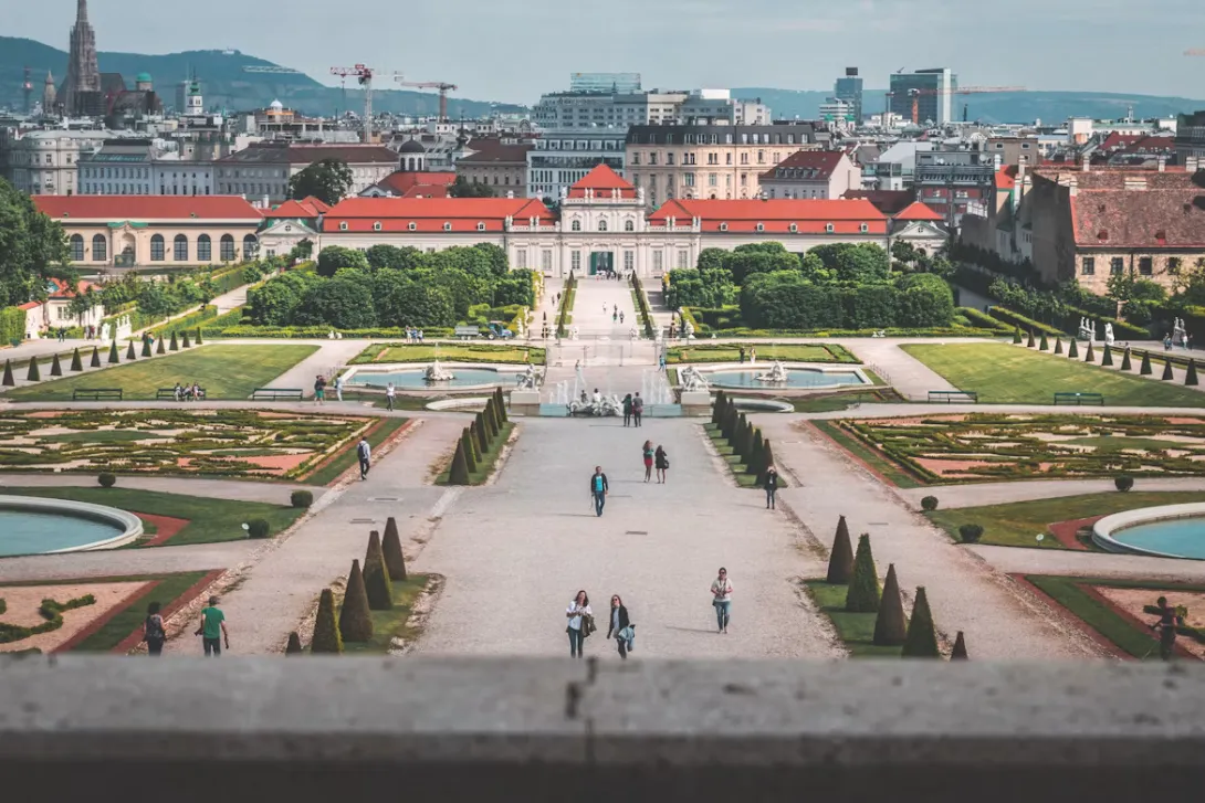 Panoramic view of Vienna, Austria, featuring the historic city center, St. Stephen's Cathedral, elegant imperial architecture, and the Danube skyline under soft daylight, showcasing the cultural charm of the starting point of a Vienna to Ljubljana road trip.